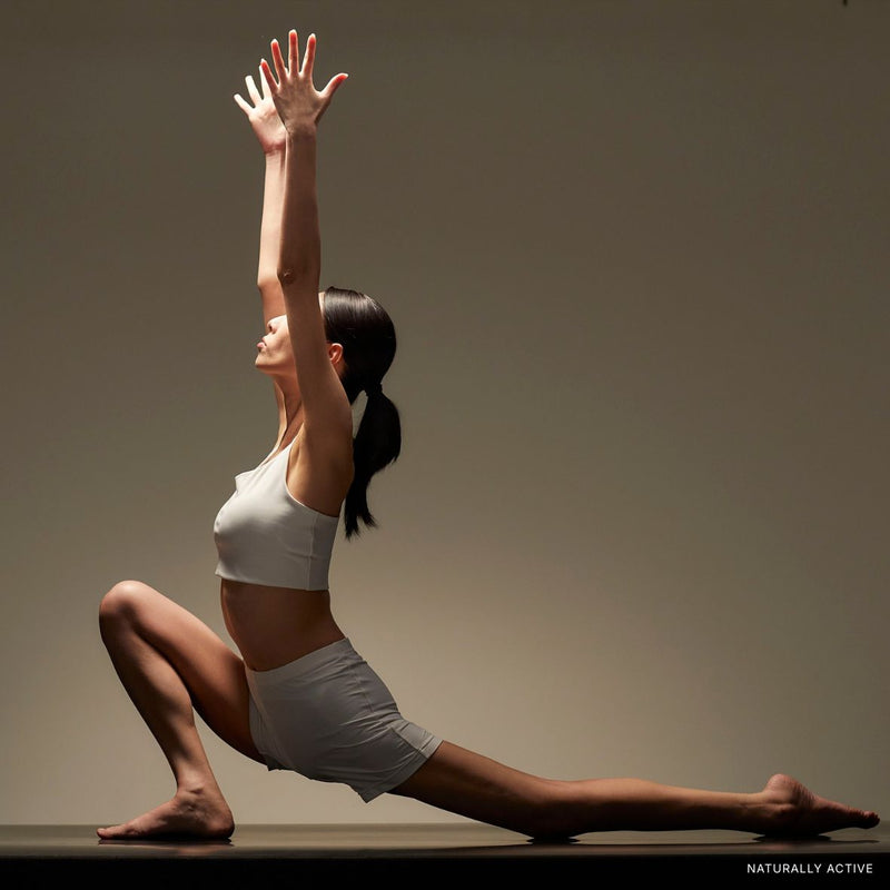 Woman stretching yoga pose